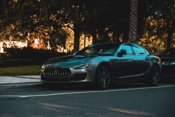 Maserati repair in Denver, CO with Auto Imports of Denver. Image of gray new maserati vehcile parked on the side of a residential area street.