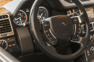 Land Rover mechanic and repair in Denver, CO. with AutoImports of Denver. Image of Land Rover steering wheel and dashboard